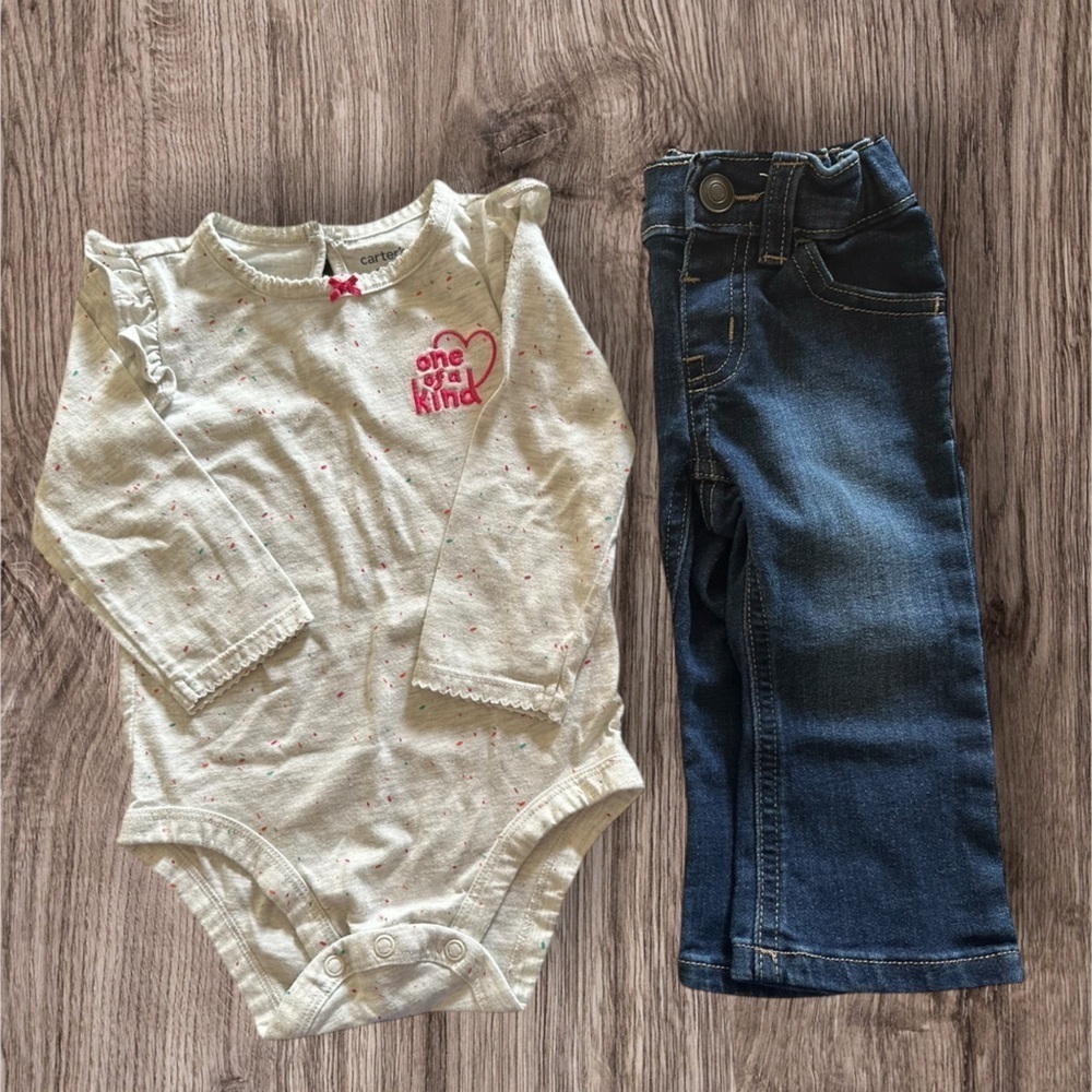 12m girl’s Jeans and long sleeve shirt.